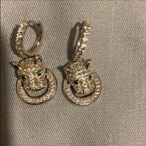 Sterling silver lion earrings